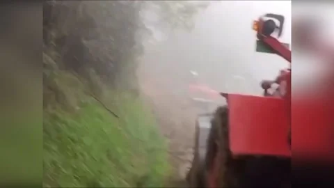Italy: Crews Clearing Mud-Covered Roads as Emilia Romagna Battles Severe Wea... Stock Footage 289544743