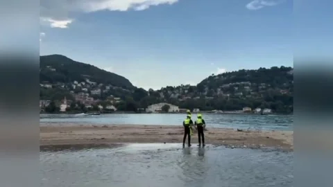 Italy: Desperate Search Underway For Missing 10 Year Old Girl At Lake Com... Stock Footage 340250677