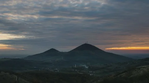 Italy hills with clouds moving before sunset arrival 4k timelapse Stock Footage