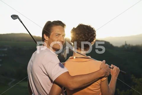 Italy, Kastelruth, Mid adult couple looking at mountains Stock Photos