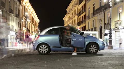 Italy lockdown, time lapse of people walking on street at night . Stock Footage 140748176