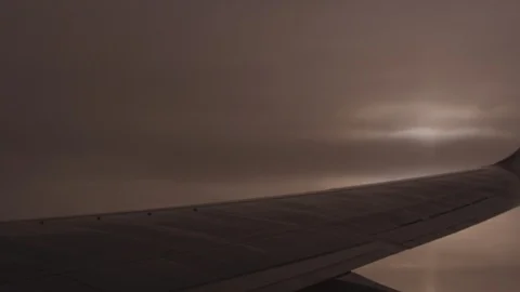 Italy package 12 | Dramatic clouds next to airplane wing Stock Footage 115970969