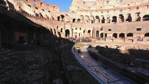 Italy, Rome, Coliseum: panoramic view of the inside arena on a sunny winter morn Stock Footage 100877519