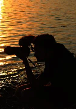 Italy: Silhouette of Photographer. Stock Photos