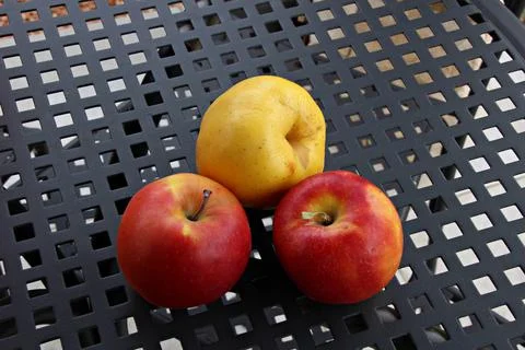 Italy: Three apples on the table. Stock Photos