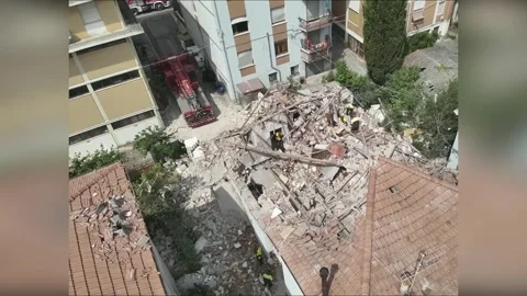 Italy: Three Dead In Building Explosion And Collapse Stock Footage 336577913