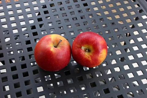 Italy: Two apples on the table. Stock Photos