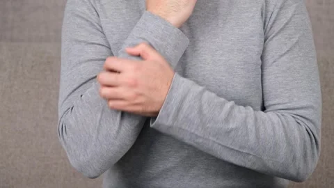 Itching arm skin Stock-Footage 264585040