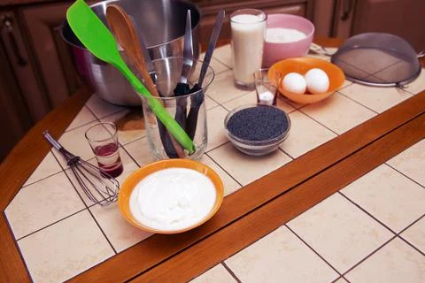 Items and products for making a cake on the table. Stock Photos