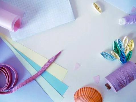 Items for handmade creativity in lilac palette on a light background Stock Photos