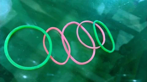 The items in the image are called rubber bands. Stock Photos