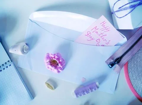 Items for needlework on a light background, preparation for mother's day Stock Photos