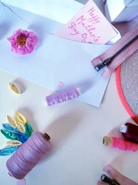 Items for needlework on a light background, preparation for mother's day Stock Photos