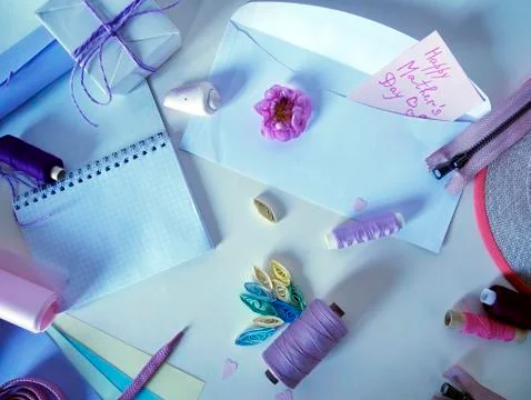 Items for needlework on a light background, preparation for mother's day Stock Photos