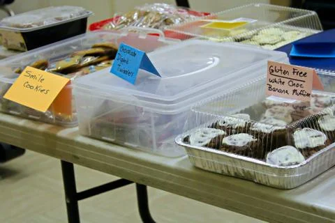 Items set up on a table at a bake sale Stock Photos