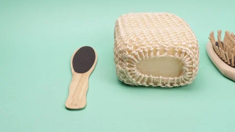 Items for Wellness in the bathroom with the green background. Stockbeeldmateriaal 127704901