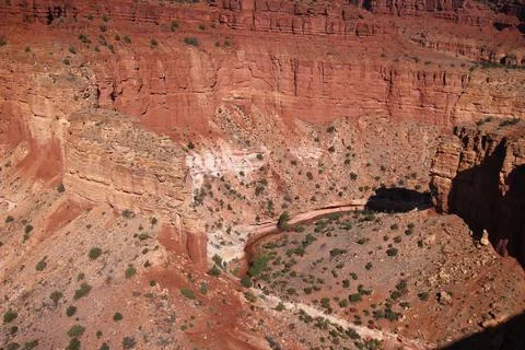 IThe course of the red river surrounded by red rock walls in the Capitol Reef Na Stock Photos