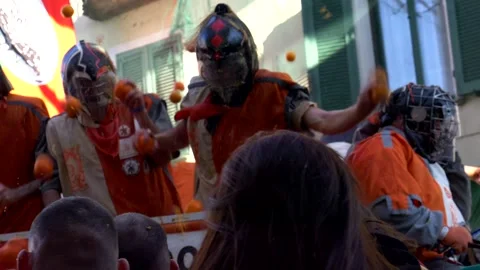 Itlay, Ivrea, 03-02-2025. Orange violent battle at the Ivrea carnival Stock Footage 319855829