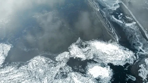 It's an aerial view. The rapid movement of the camera over the newly frozen Stock Footage 121497729