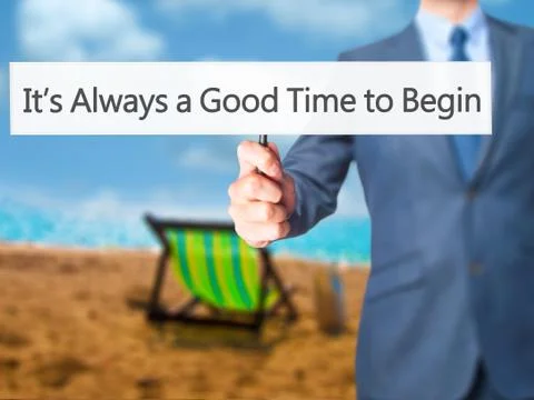 It's Always a Good Time to Begin - Businessman hand holding sign Stock Photos