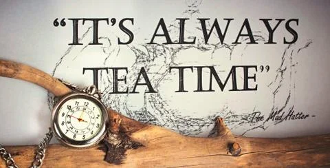 Its always time for tea - silver pocket watch with chain on a tree branch Stock Photos