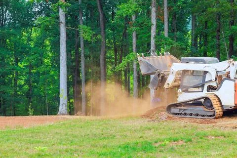 With its compact design efficient functionality mini bulldozer carries out 写真素材