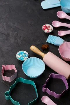 It's cooking time. Baking tools on dark. Recipe book background concept. Stock Photos
