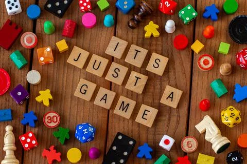"Its Just a Game" is spelled out in wooden letter tiles Foto stock