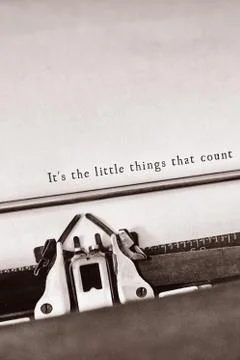 It's the little things that count message on a white background against close Stock Photos