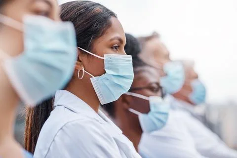 Its not easy being a frontline worker. Closeup shot of a group of doctors Stock Photos