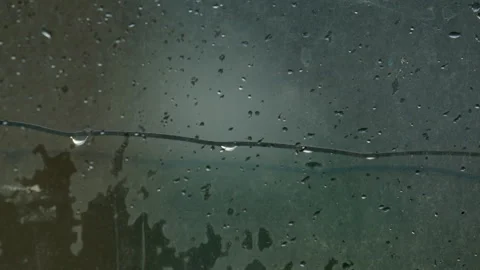 It's raining. sad cinematic. raindrops on window Video stock 284434577