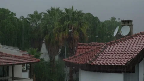 It's raining on the tiled roofs Stock Footage 226944230