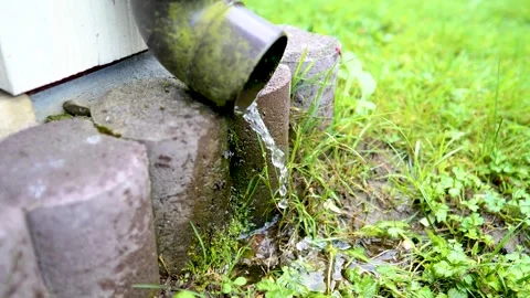 It's raining. water flows from the gutter Stock Footage 201940807