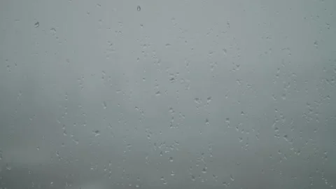 It's snowing outside. Snow is falling outside the window. Stock Footage 325985002
