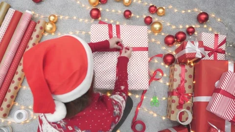 Its time for festive gift wrapping as we celebrate Christmas with cheer Stock Footage 289732084