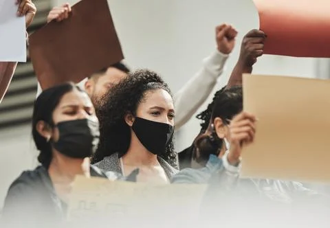 Its time to get involved. Low angle shot of a group of people holding signs Stock Photos