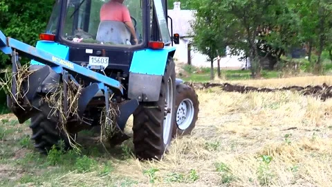 It's time to plow the land tractor plows the land Ukraine Stock Footage 137299500