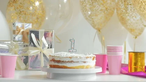 It's time to share birthday cake. First year 1080p fullHD Stock Footage 75891055
