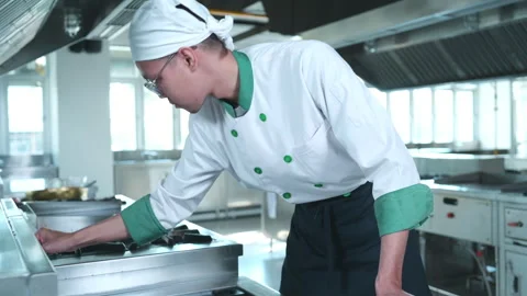 It's time to tidy the kitchen after finishing the culinary task. Video stock 256003453