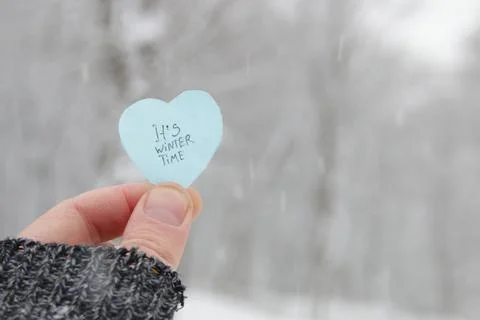 Its winter time concept. Winter background with heart. Stock Photos