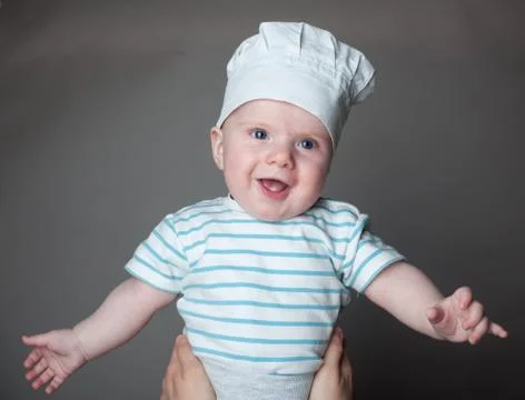 Ittle boy in a chef hat Stock Photos