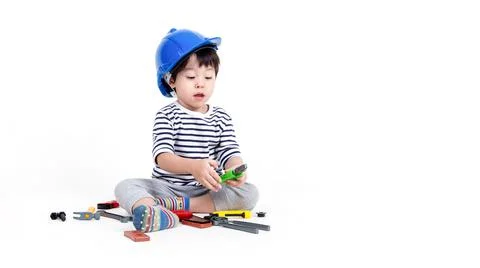 Ittle boy playing act engineer, education concept. Stock Photos