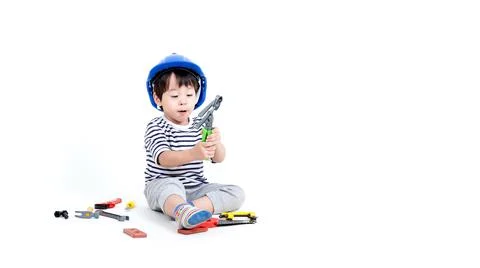 Ittle boy playing act engineer, education concept. Stock Photos