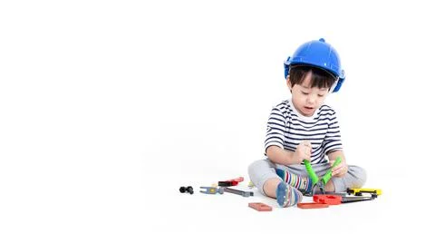 Ittle boy playing act engineer, education concept. Stock Photos