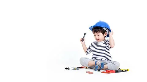 Ittle boy playing act engineer, education concept. Stock Photos