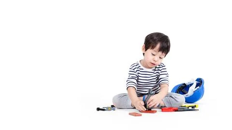 Ittle boy playing act engineer, education concept. Stock Photos