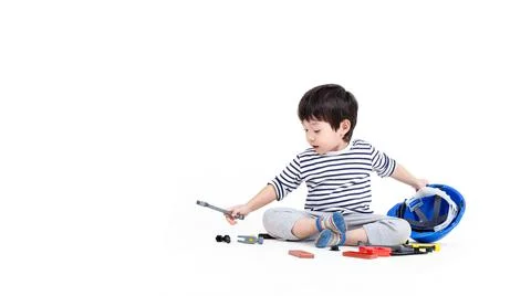 Ittle boy playing act engineer, education concept. Stock Photos