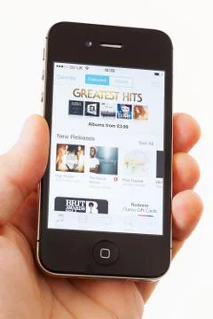 Itunes store on an apple iphone 4s Foto stock