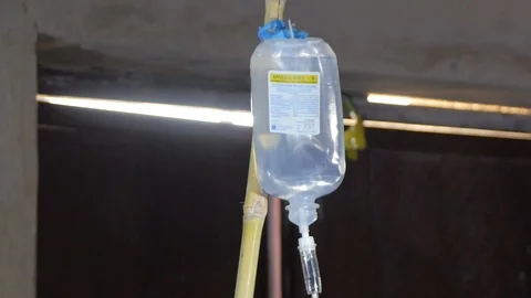 An IV Bag Hangs from a Pole co Stock Footage 115736827