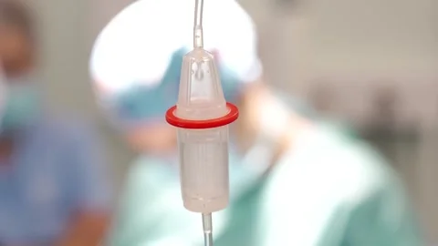 I.V. drip. Administration of anesthesia to a patient during surgery. close_up Stock Footage 292007654